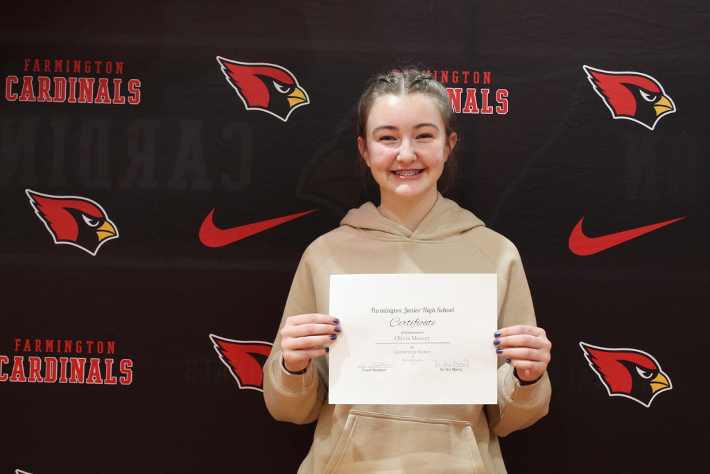 Student with her certificate
