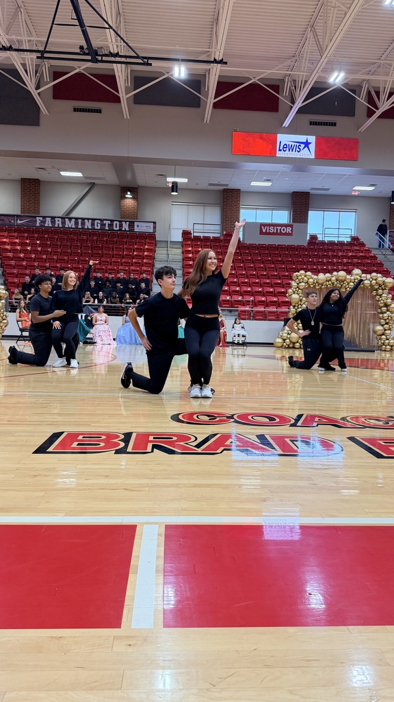 dance team performing on court