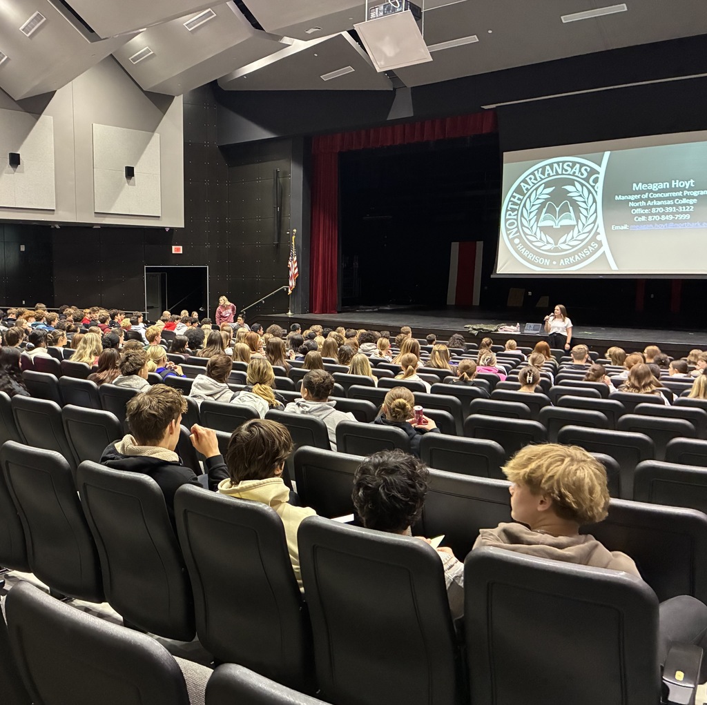 students listening to a presenter