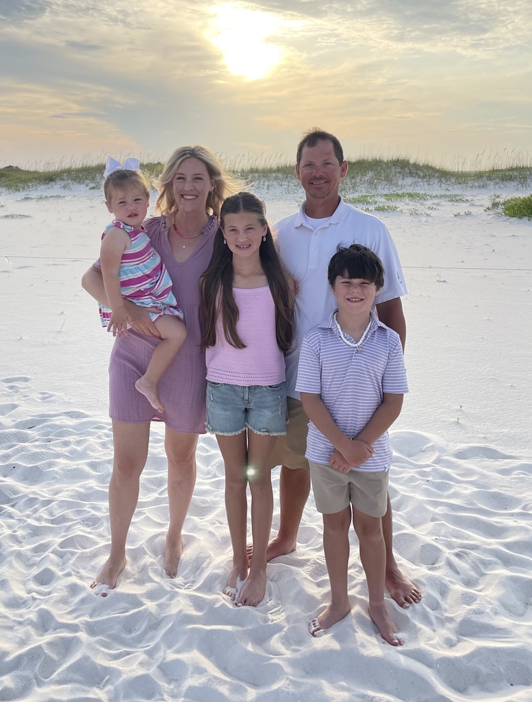 picture of counselor and her family on beach