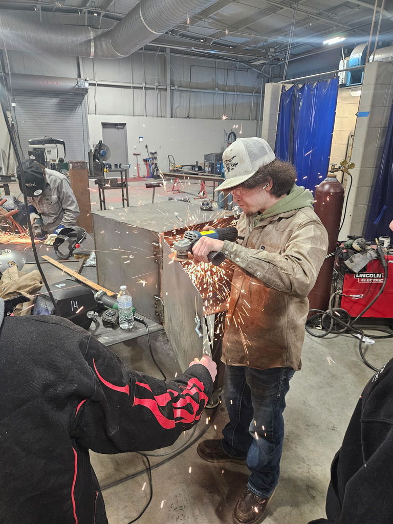 students welding