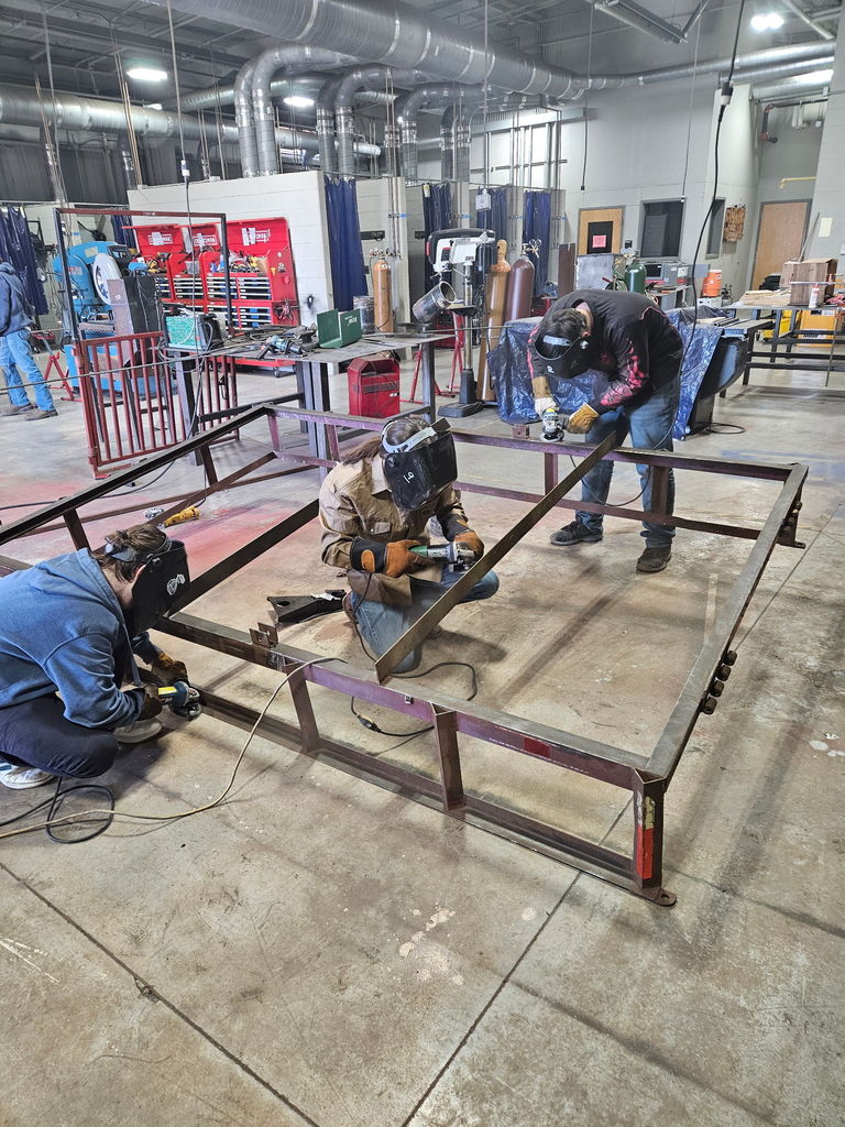 students welding