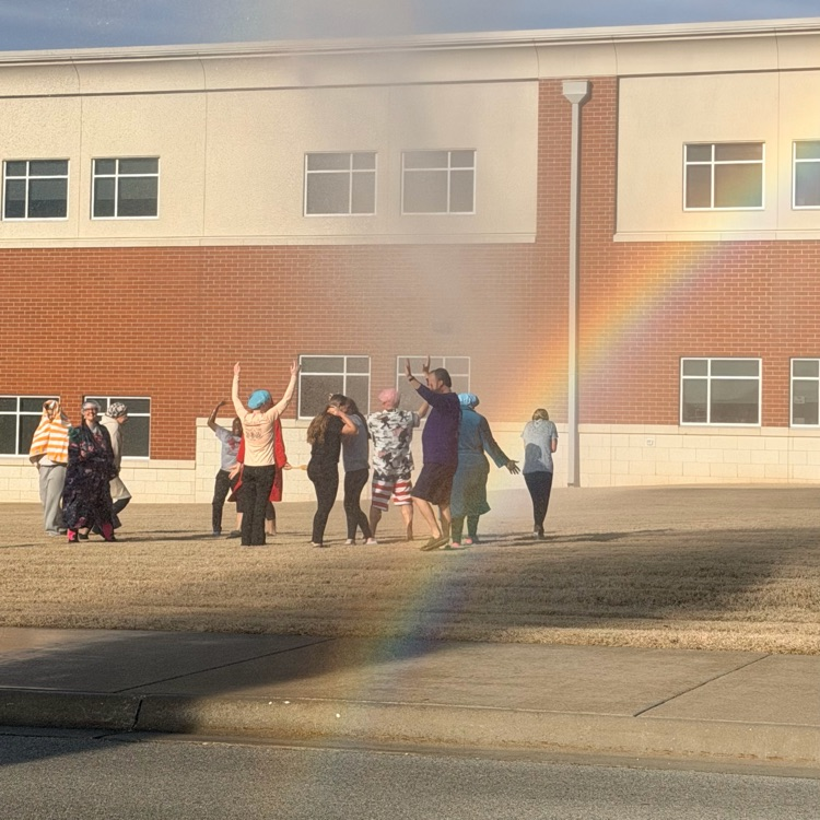 volunteers getting sprayed 