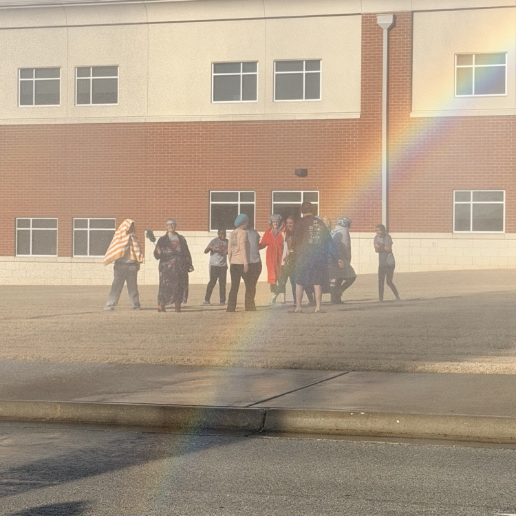 volunteers getting sprayed 