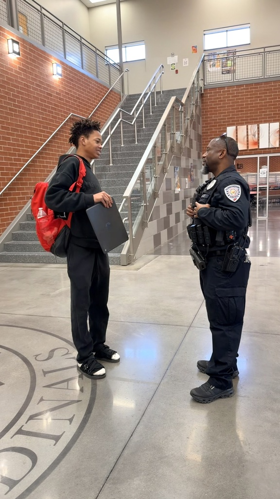 officer talking with student 