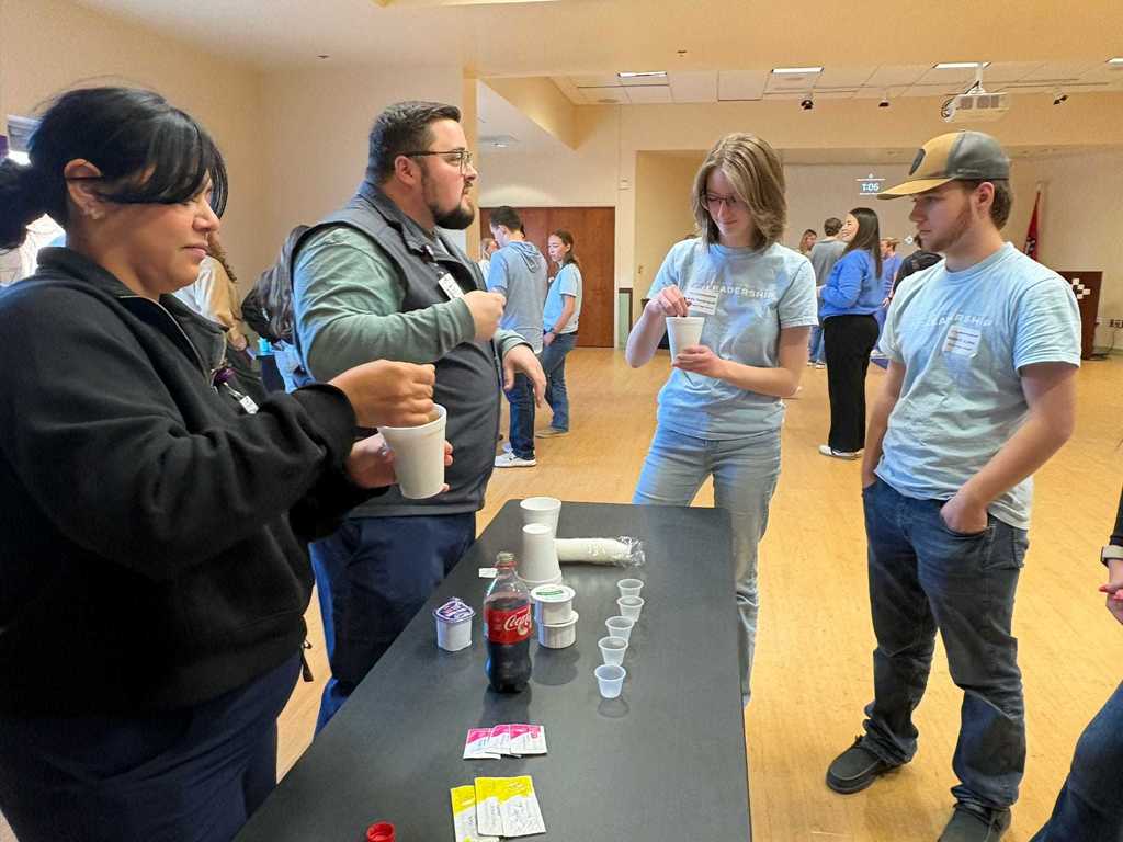 students looking at medical equipment
