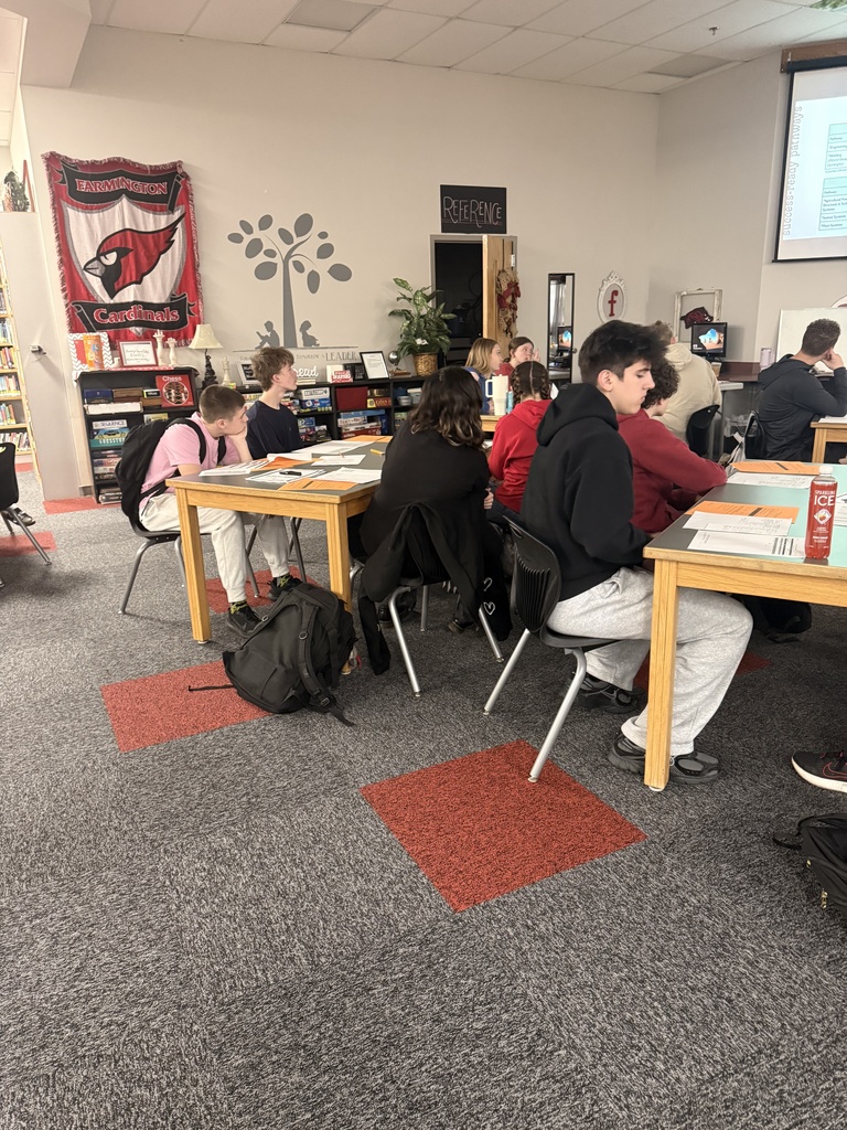 students working at tables