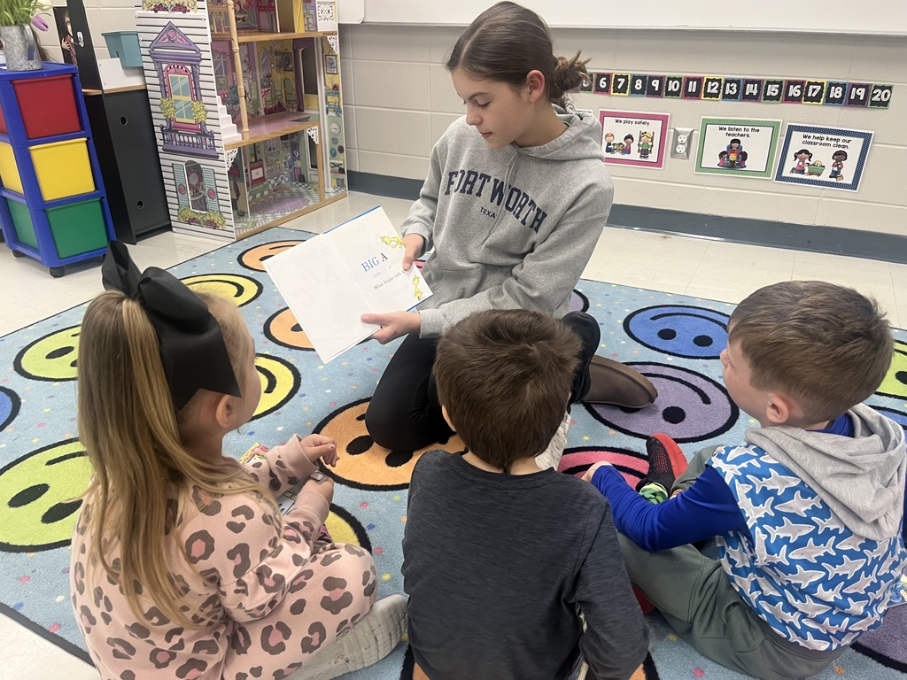 FJHS student reads to PreK