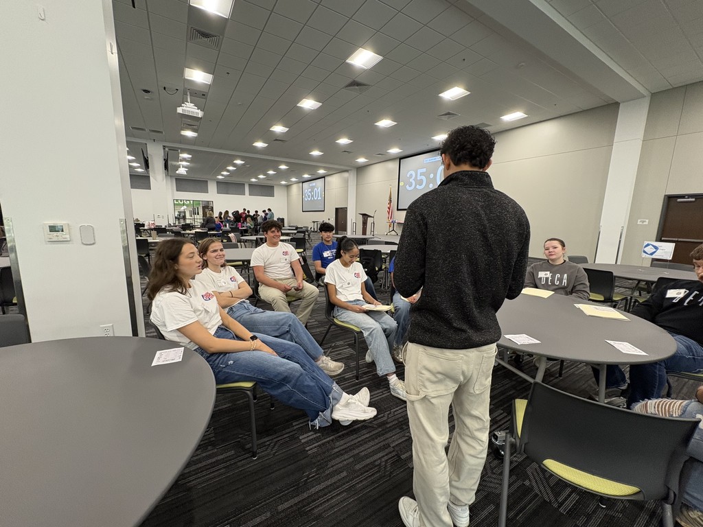 students learning in small groups