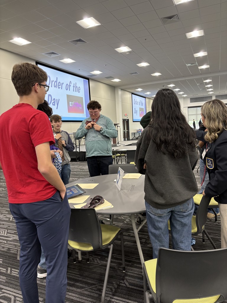 students learning in small groups