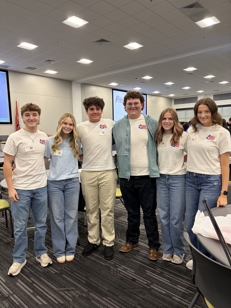 students learning in small groups