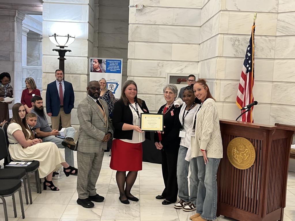 Cardinal Academy students and staff receiving ELA award