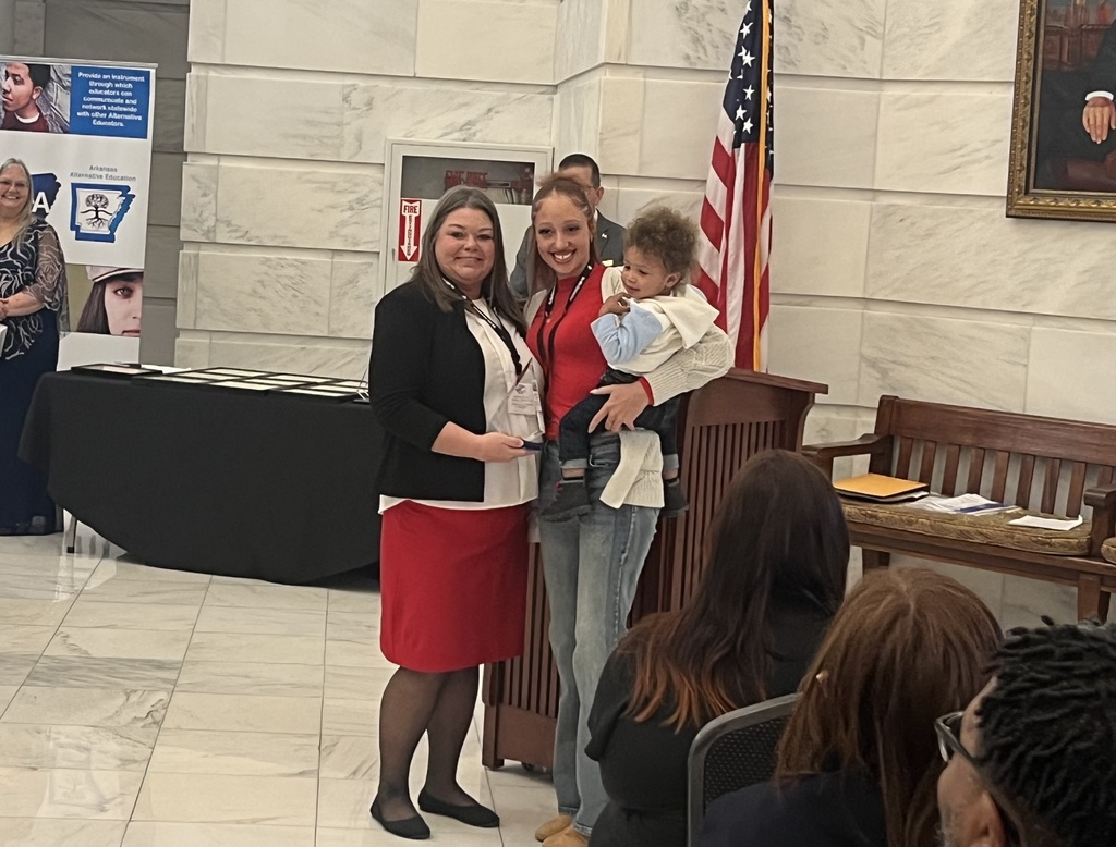 Mrs. Carver and Shaina receiving the diamond award. 