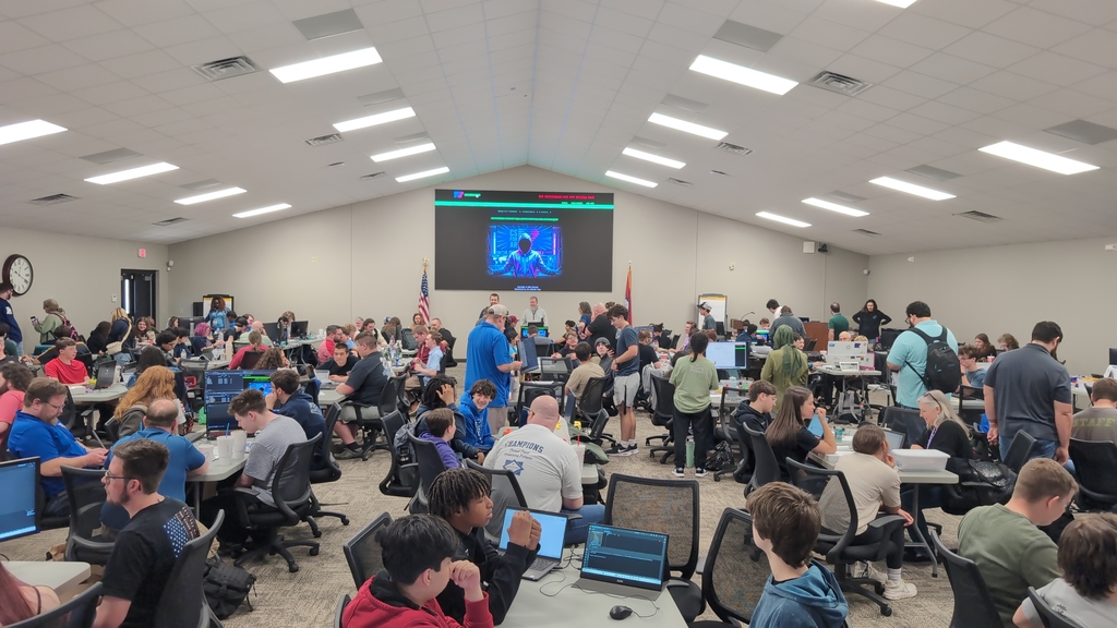 students coding in a room