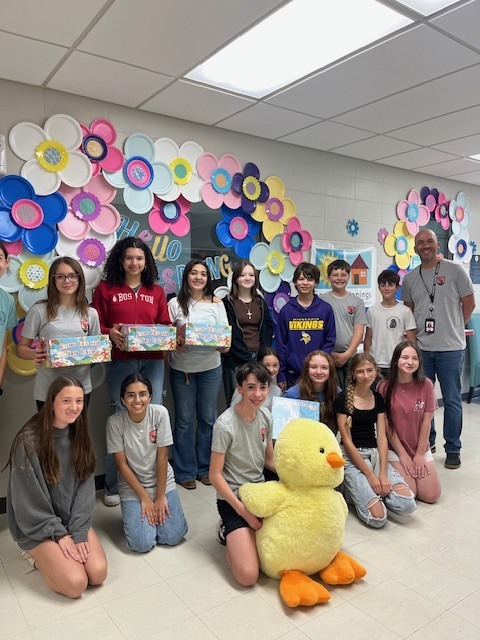 FJHS Cardinal Ambassadors helping at the pre-k Egg Hunt