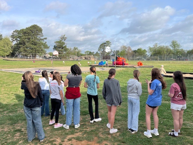 FJHS Cardinal Ambassadors helping at the pre-k Egg Hunt