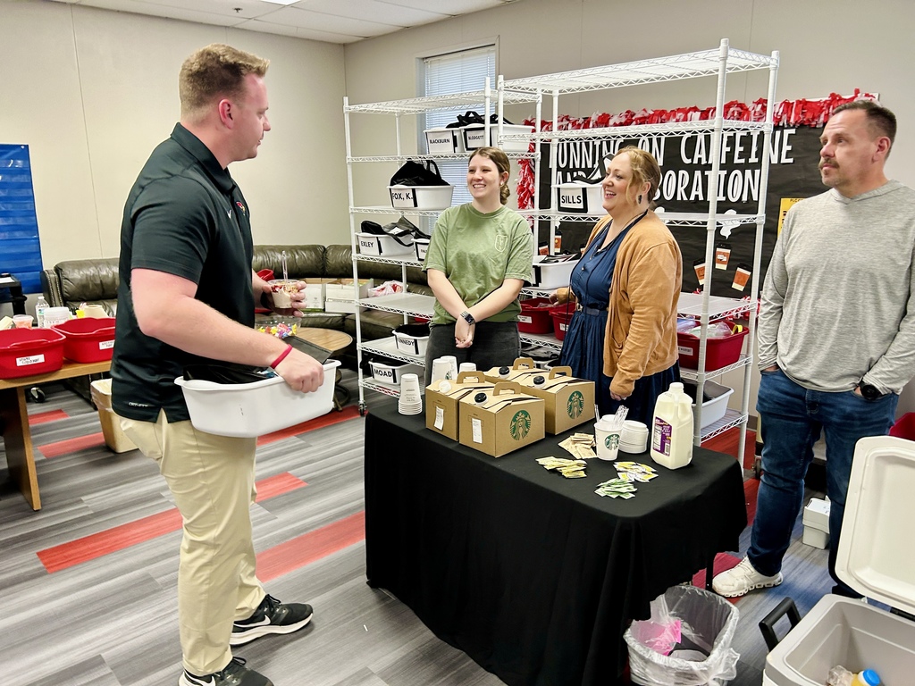 teacher talks to Cross Church Farmington members as they serve coffee