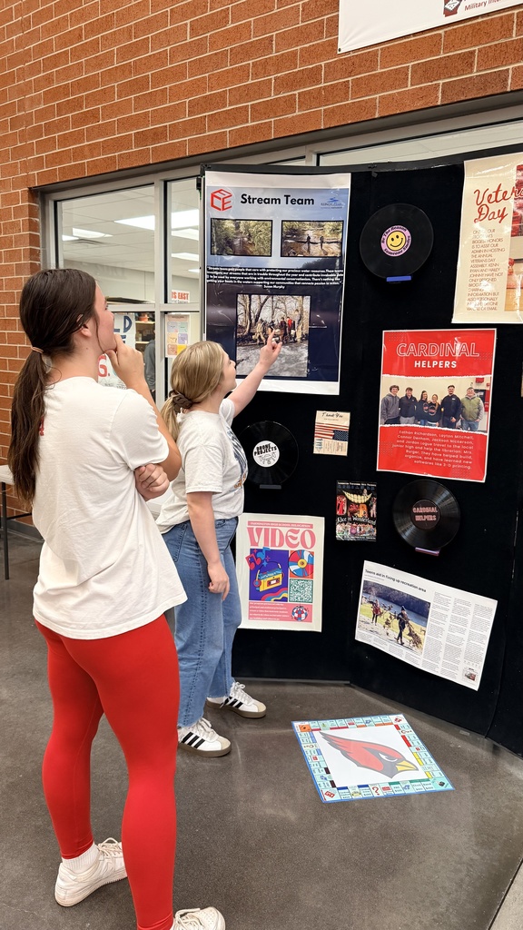 student presenting to other student