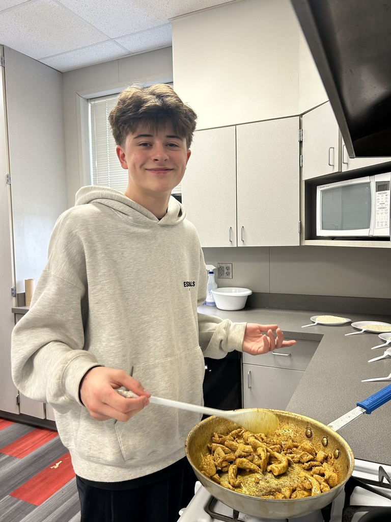 Student cooking Steven Special in FACS