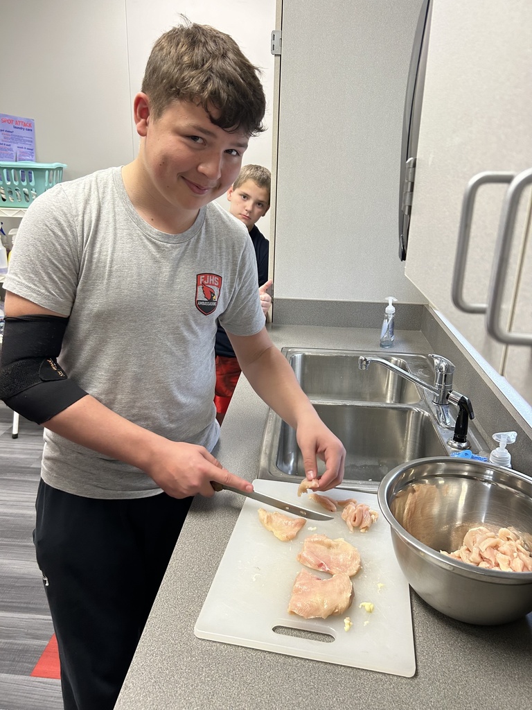 Student cooking Steven Special in FACS