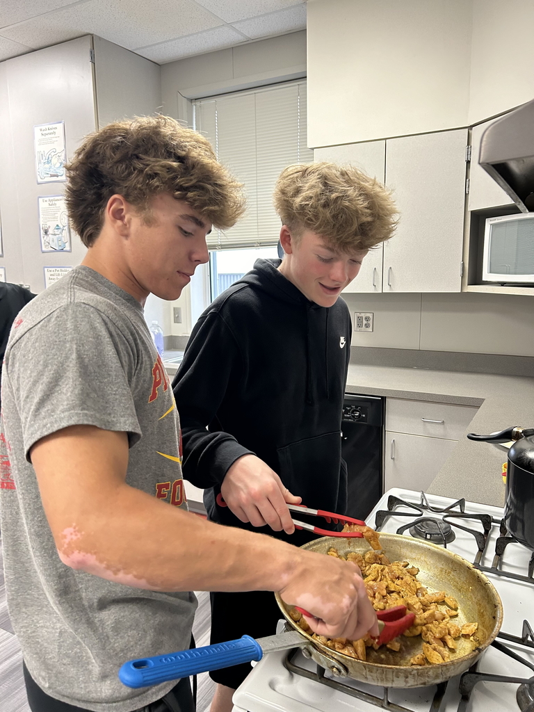 Students cooking Steven Special in FACS