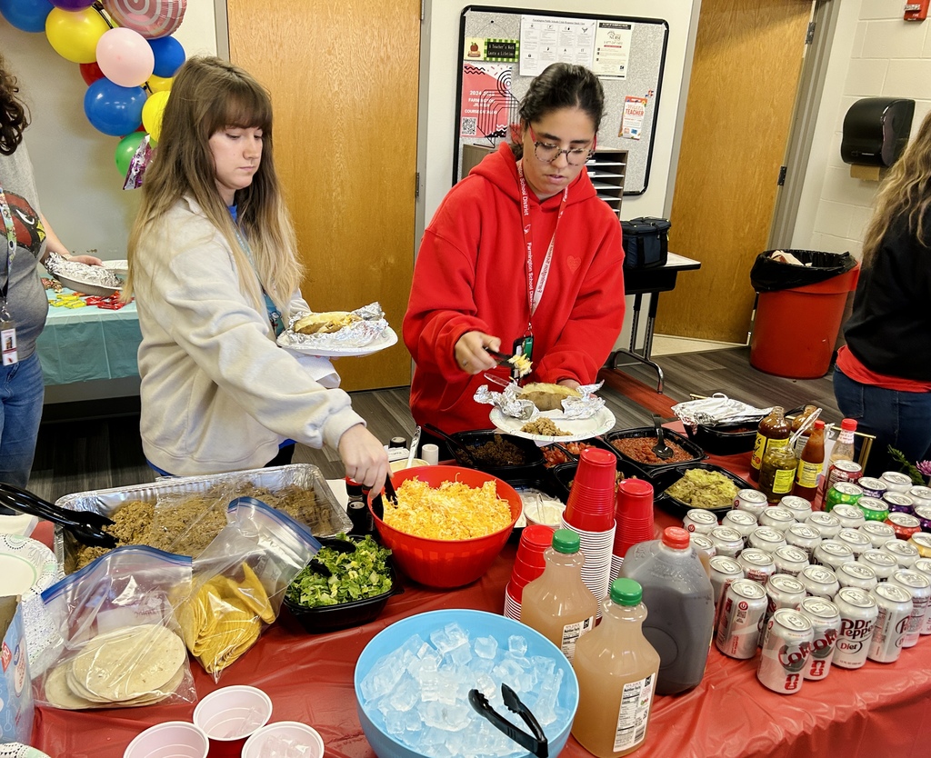 teachers getting food in lounge