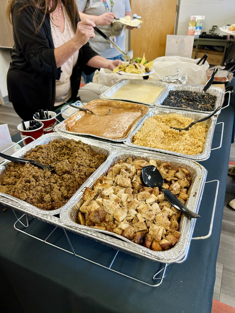 teachers getting food in lounge
