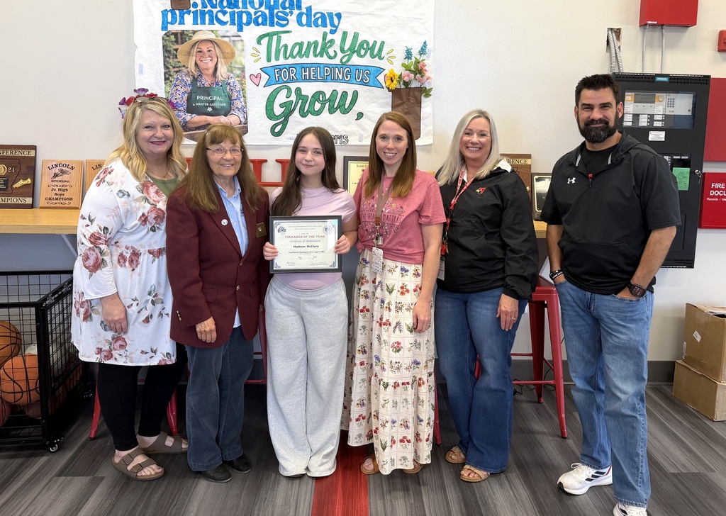 Student receiving Teenager of the Year award