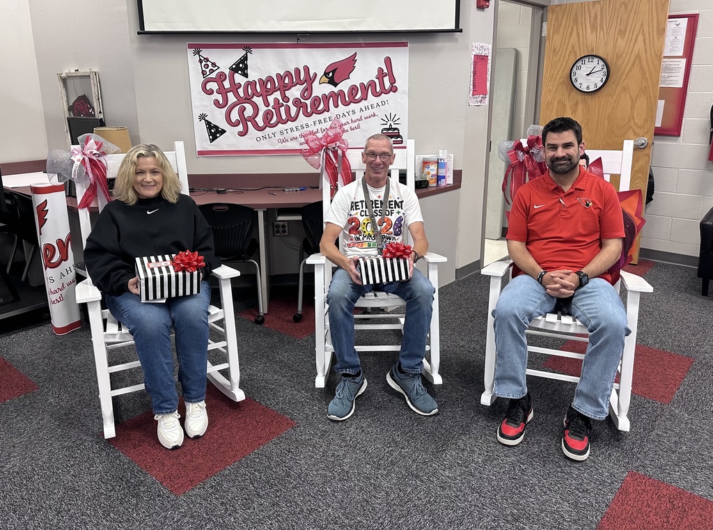 3 staff members retiring, sitting in rocking chairs