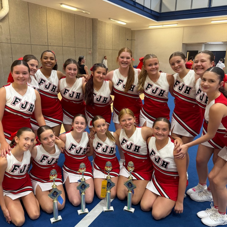 junior high cheerleaders posing