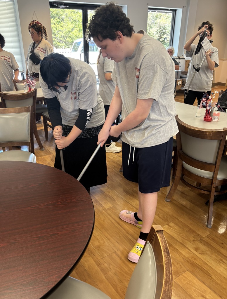 two students sweeps