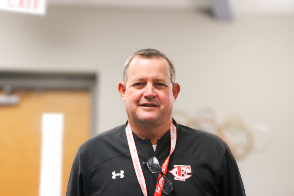 principal posing