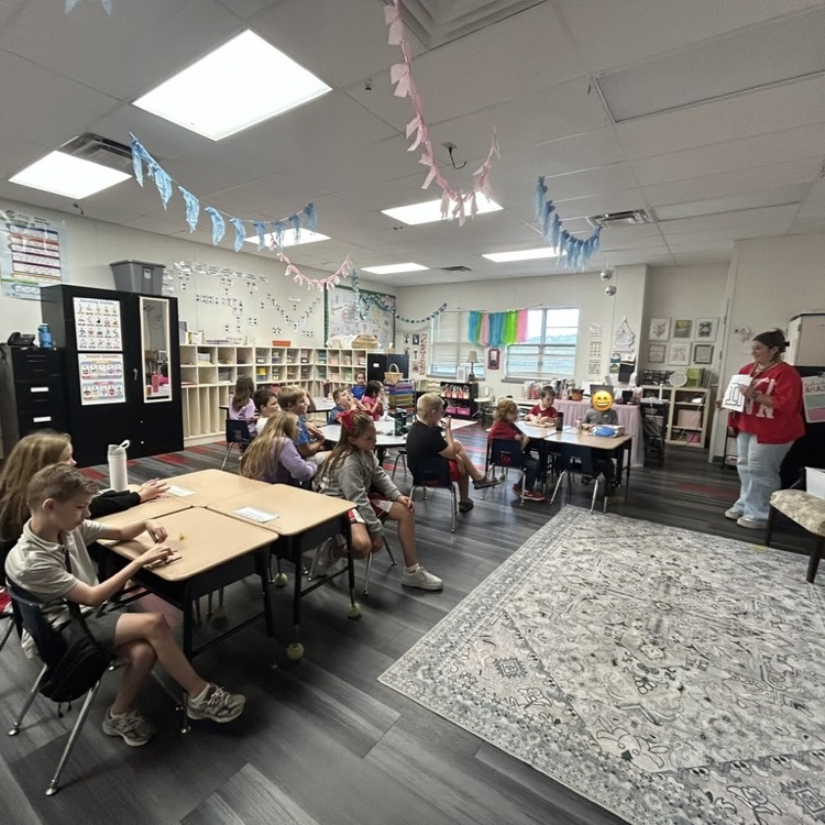 kids listening to a teacher