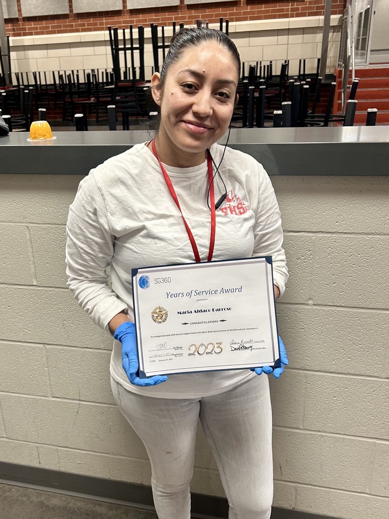 Custodian posing with certificate 