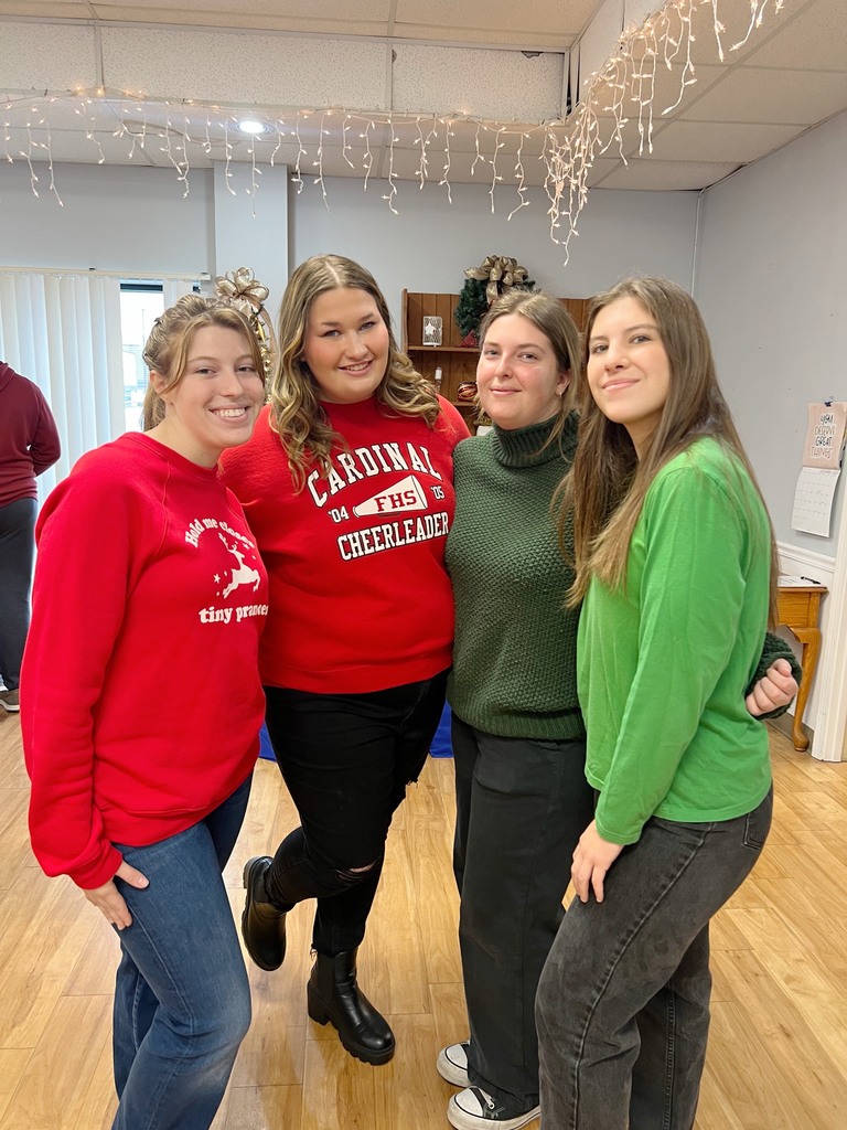 students posing at senior center