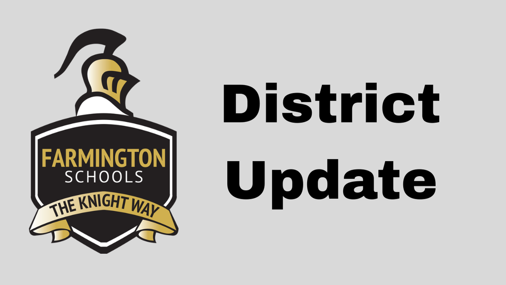 District Update (School knight and shield logo)
