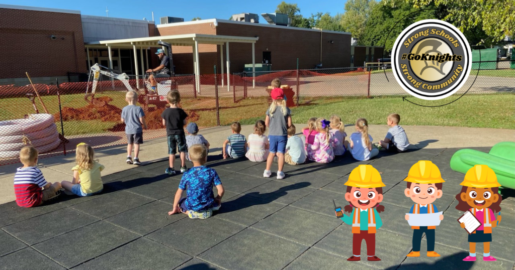 students at recess watching maintenance dig a path at TLC