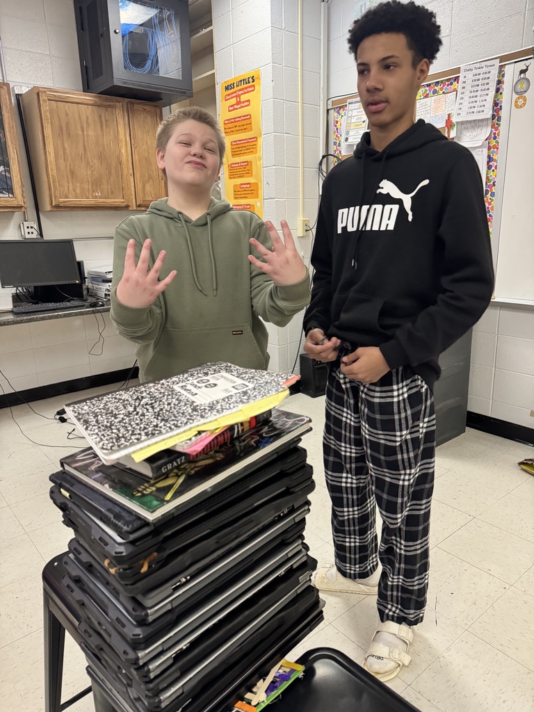 weight bearing bridge featuring 2 students, one of whom is animatedly giving 4s