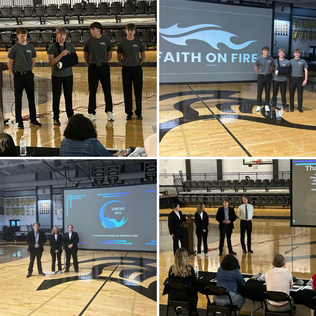 students giving their pitches to the judges