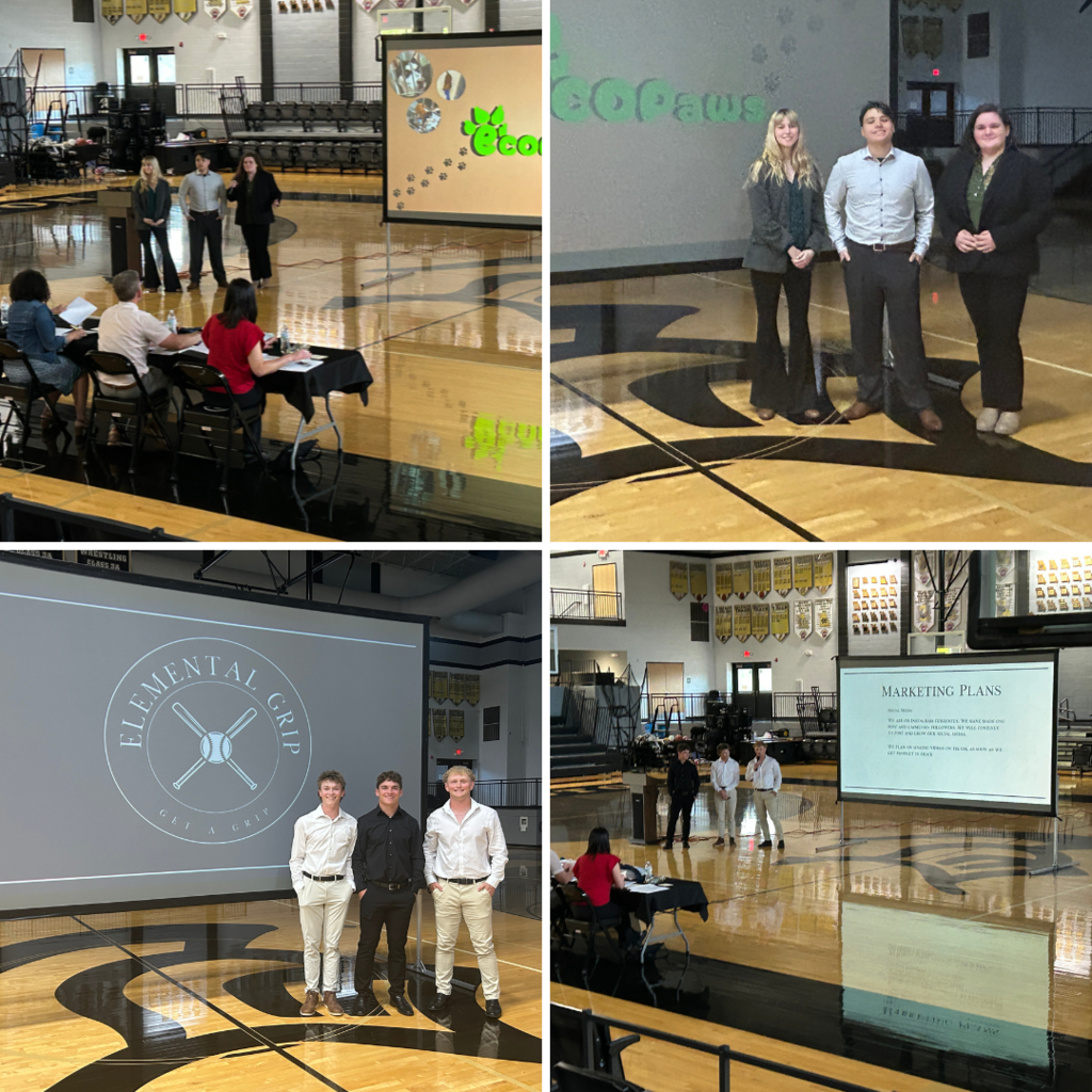 students giving their pitches to the judges