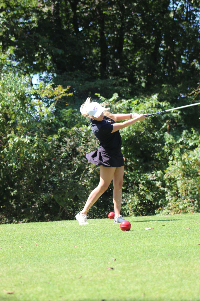 Female golfer at a match