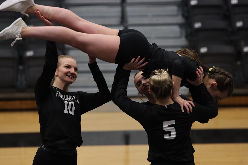 girls stunt team in a stunt