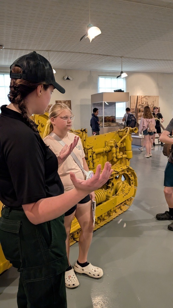 students learning from tour guide