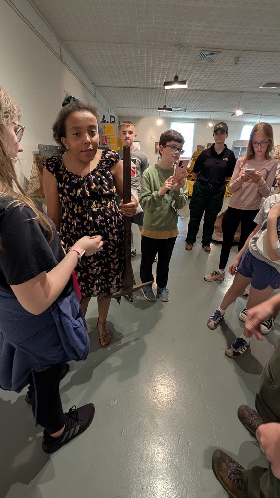 students learning from tour guide