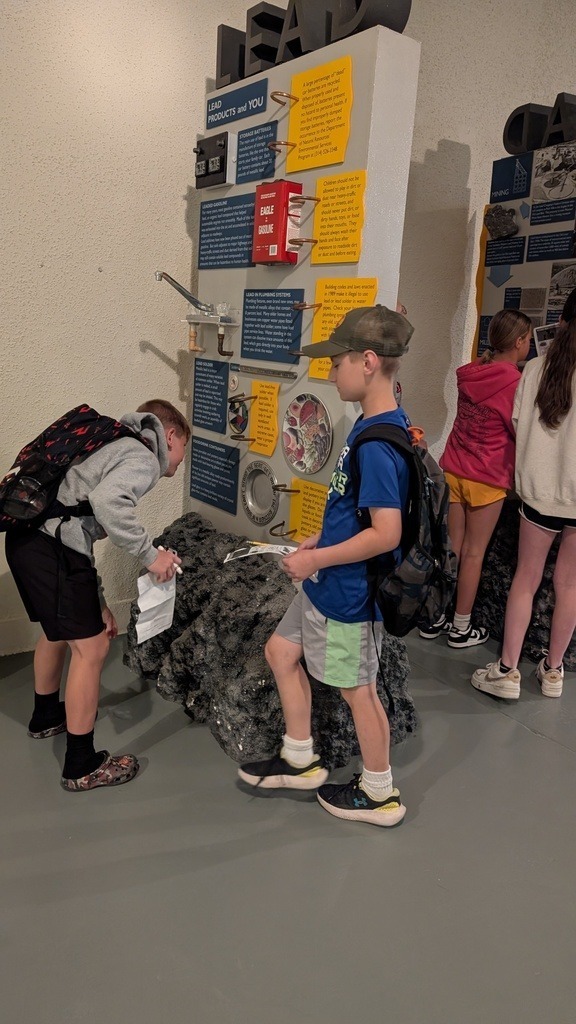 students learning about the mines inside the museum at an exhibit