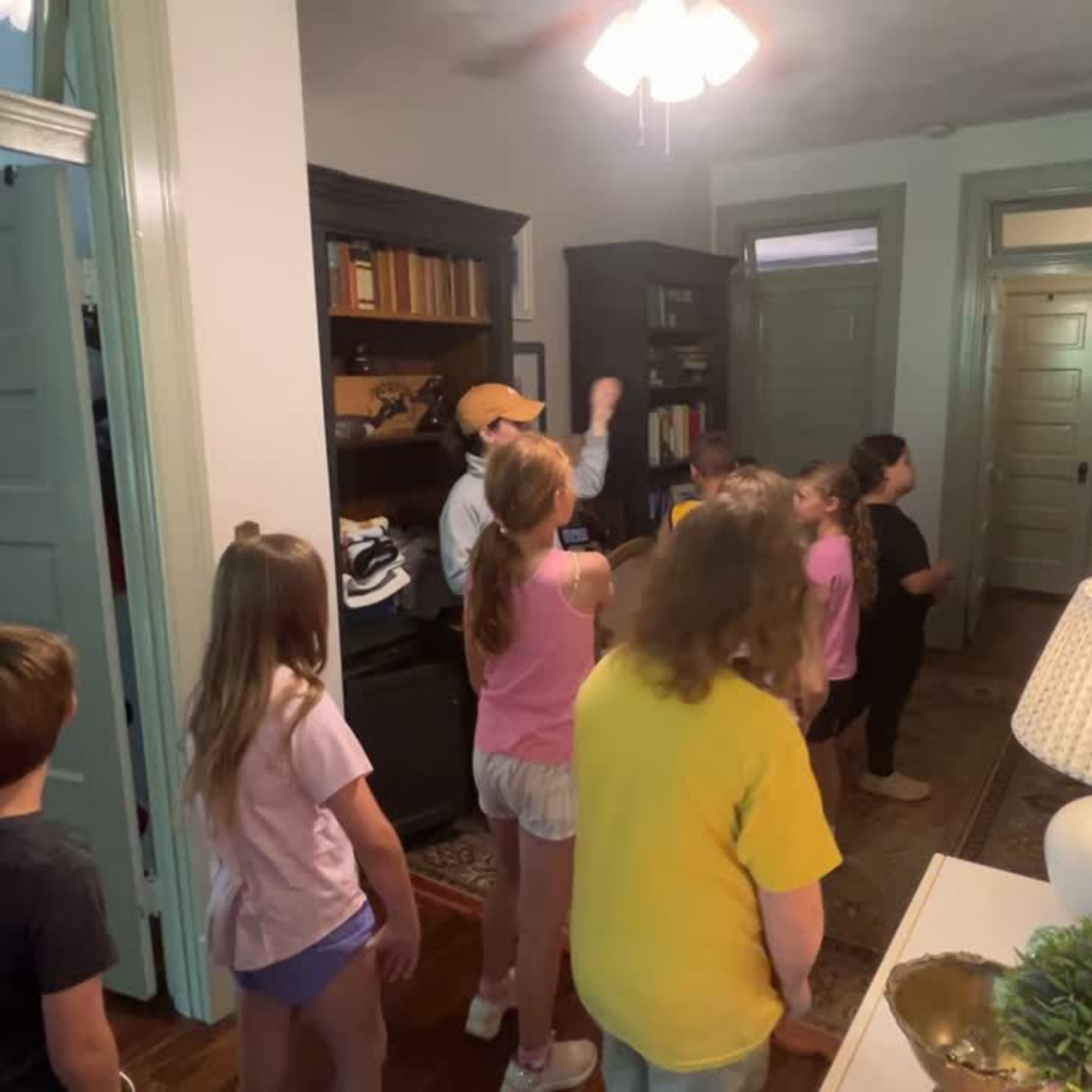 Students viewing different features of the Morrison home
