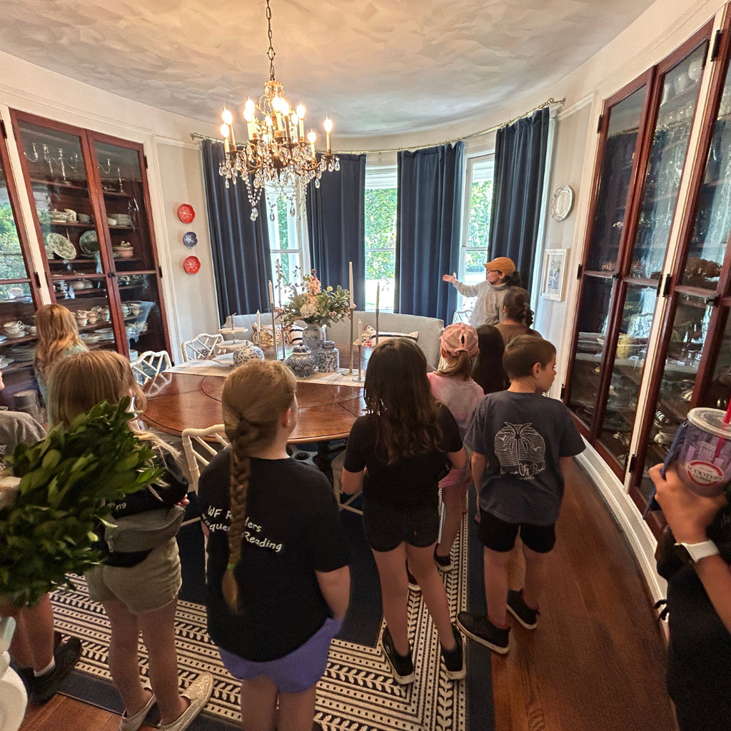 Students viewing different features of the Morrison home