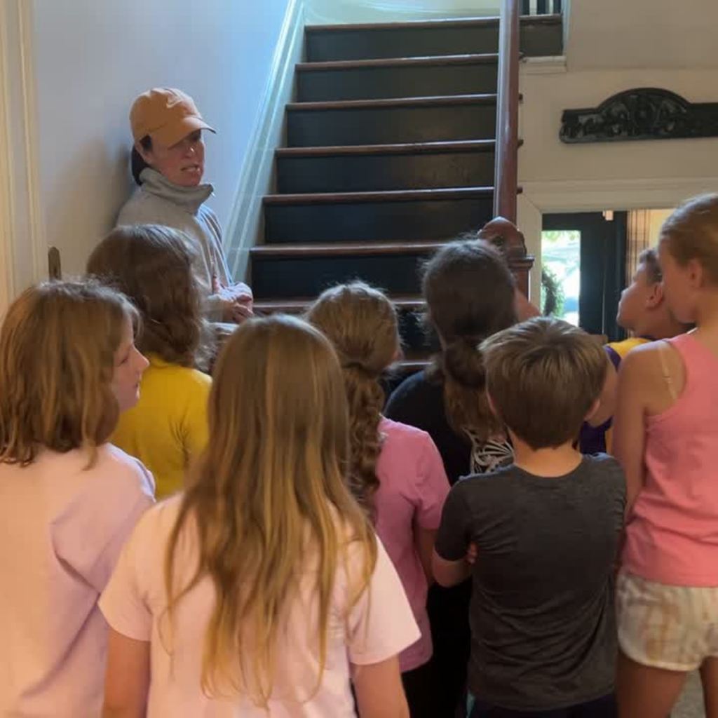 Students viewing different features of the Morrison home