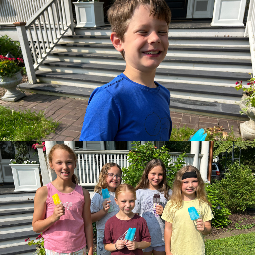 students playing in the yard waiting for their tour
