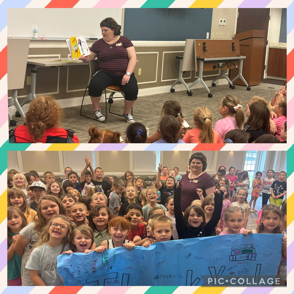 Students at the Farmington Public Library with the librarian reading a book
